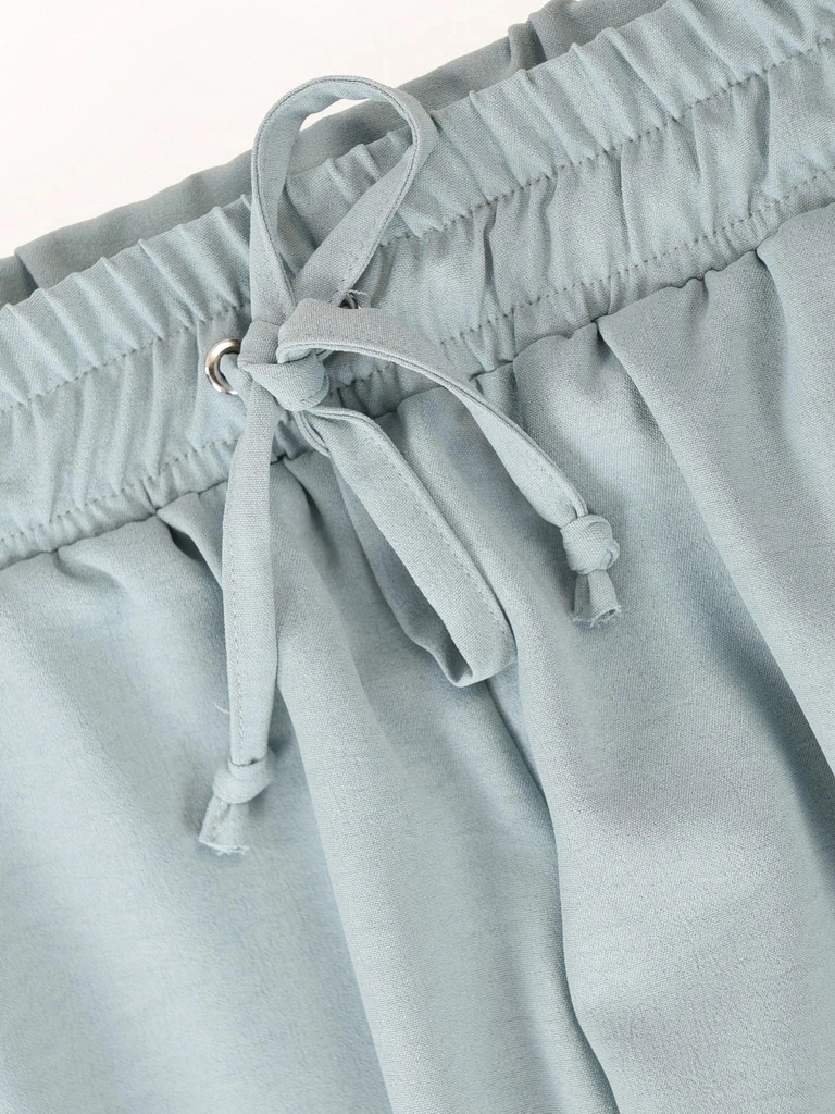 Miętowe spodnie damskie z wiskozy na gumce – luźny fason zapewniający swobodę i wygodę 40119