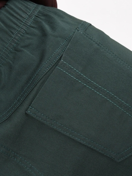 Ponadczasowe spodnie damskie butelkowa zieleń prosty fason – dla idealnego dopasowania i wysmuklenia sylwetki plus size 34867