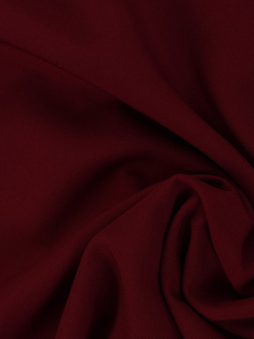 Kopertowa sukienka z tkaniny, kreacja z ozdobnym guzikiem 23572