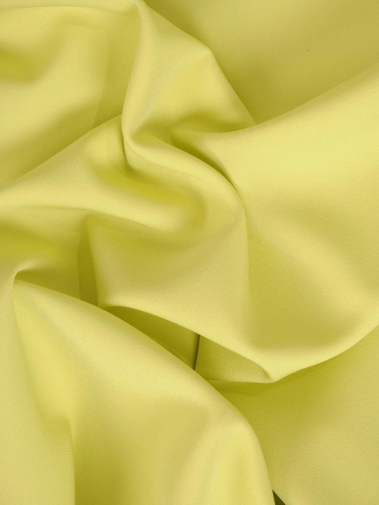 Wizytowa sukienka trapezowa w odcieniu limonki – model tuszujący biodra z krótkim rękawkiem 21111