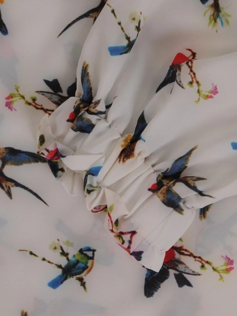 Elegancka bluzka wizytowa damska ecru we wzory – prosty, swobodny fason z długim rękawem 11771