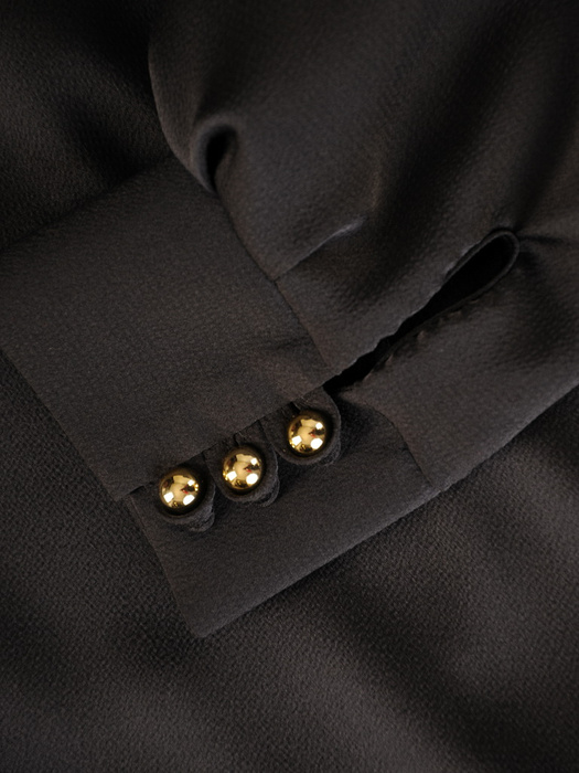 Elegancka bluzka z ozdobną kokardą na dekolcie 32365