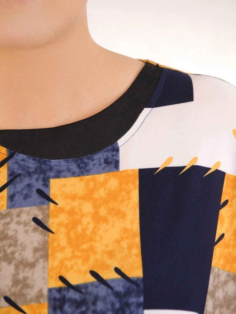 Wielobarwna bluzka damska z ekoskórą w modny patchwork – fason kimono, maskujący talię i wysmuklający plecy 32505