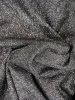 Czarna sukienka koktajlowa z brokatowym zdobieniem – rozkloszowany fason z kopertowym dekoltem 39444