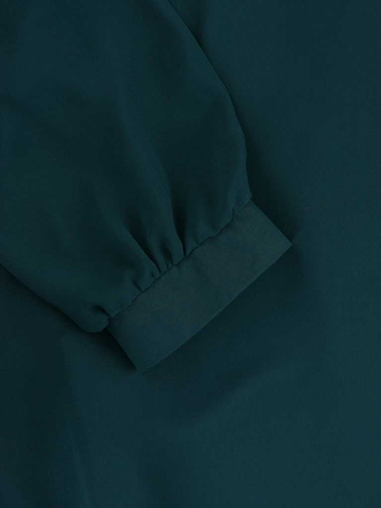 Elegancka sukienka trapezowa w butelkowej zieleni – fason maskujący biodra na jesienne wyjścia 14854