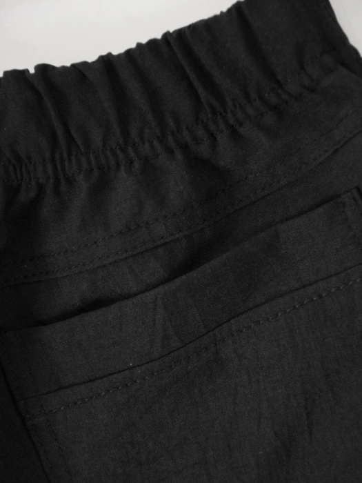 Czarne spodnie palazzo plus size z wysokim stanem – wysmuklające sylwetkę, idealne na lato 38368