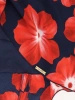 Elegancka granatowa sukienka trapezowa w motyw kwiatowy – wysmuklający fason z wiązaniem 18286