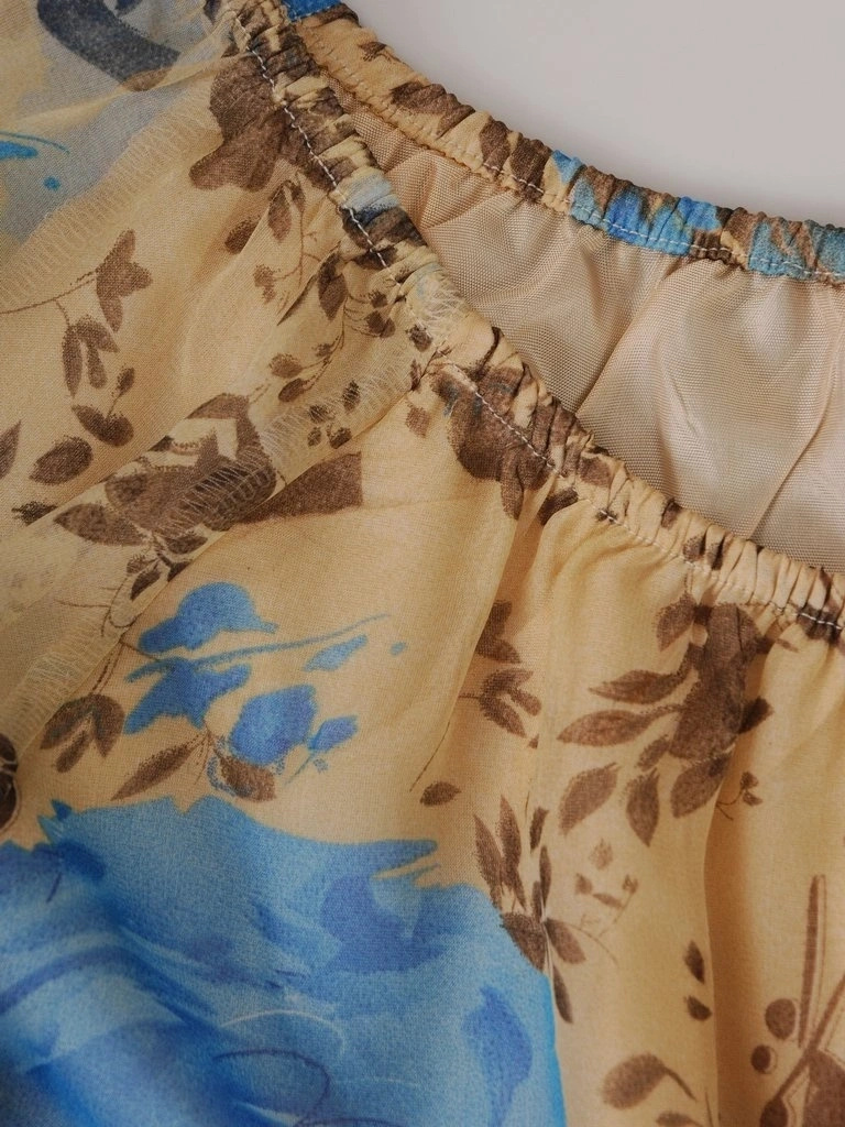 Wiskozowa sukienka trapezowa w kwiaty – kobiecy krój maskujący biodra z rękawem 3/4 15356