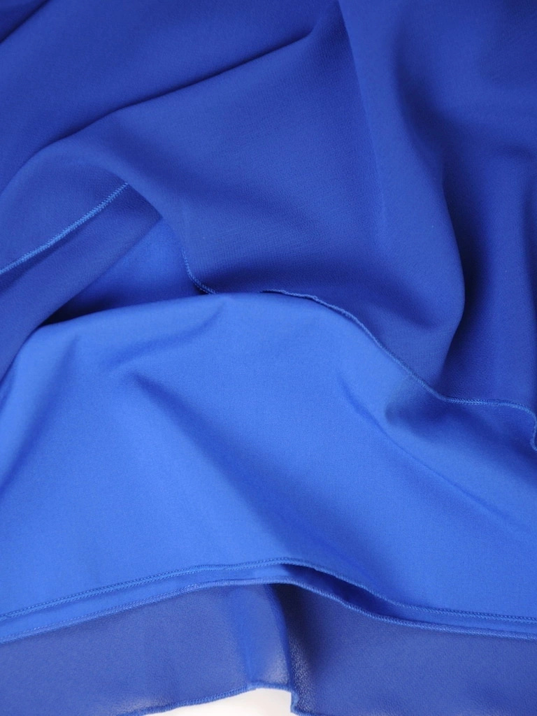 Elegancka chabrowa sukienka trapezowa midi – falbany na rękawach i luźny fason 35219